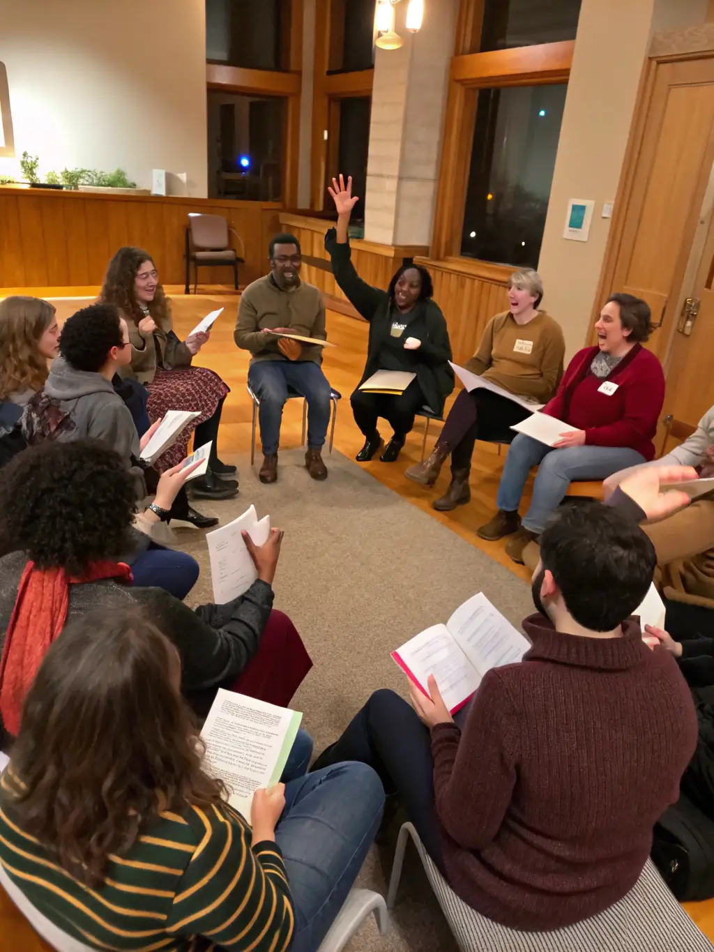 A photo of participants gathered at a knowledge-sharing session, listening attentively to an experienced equestrian expert.